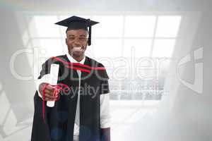 Composite image of man smilling at graduation