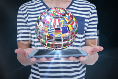 Composite image of close up of man holding tablet