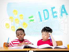 Composite image of cute pupils writing at desk in classroom