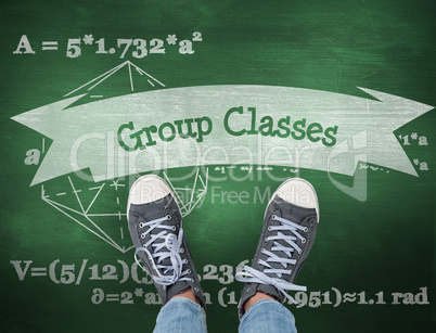 Group classes against green chalkboard