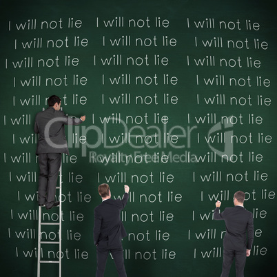Composite image of business team writing