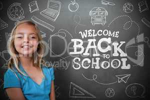 Composite image of cute pupil with chalkboard