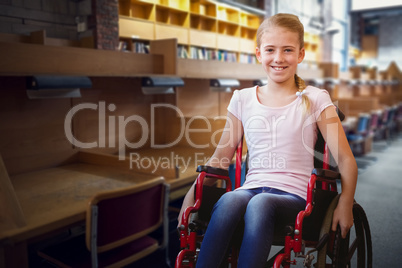 Composite image of girl sitting in wheelchair in school corridor