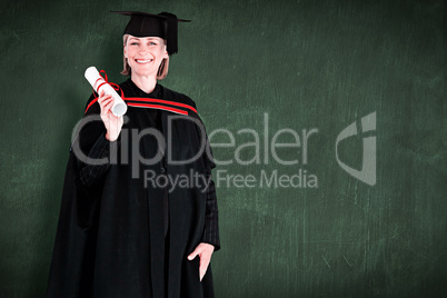 Composite image of happy blonde girl celebrating success with di