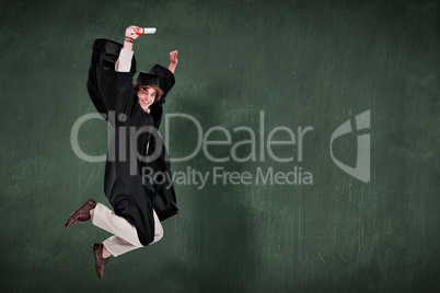 Composite image of happy male student in graduate robe jumping