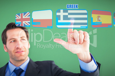 Composite image of confident businessman pointing at something