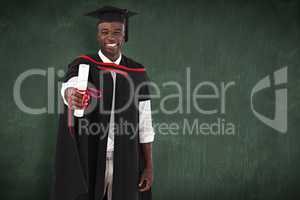 Composite image of man smilling at graduation