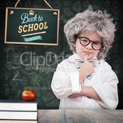 Composite image of cute pupil in lab coat