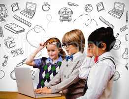 Composite image of pupils using laptop