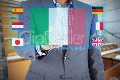 Composite image of focused businessman pointing