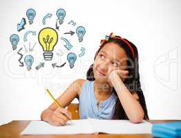 Composite image of cute pupil at desk