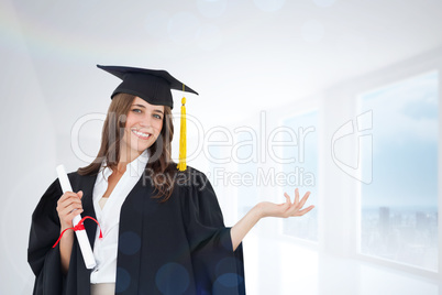 Composite image of a woman with a hand out to her side as she sm