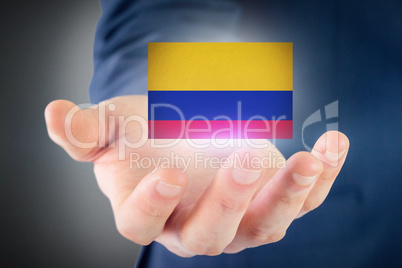 Composite image of close up view of businessman hand