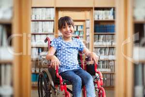 Composite image of cute disabled pupil smiling at camera in hall