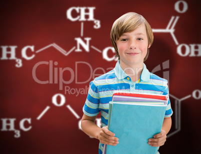 Composite image of cute pupil smiling at camera in library