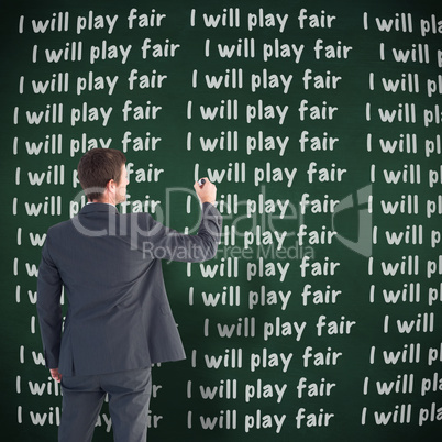 Composite image of business man writing with chalk