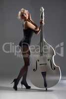 Young Woman In Lingerie With A Double Bass