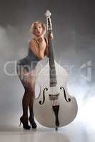 Young Woman In Lingerie With A Double Bass