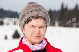 Woman in winter landscape