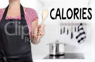 calories köchin hält kochlöffel hintergrund