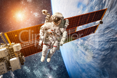 International Space Station and astronaut.