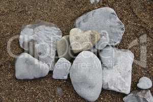 Heart shaped stone on beach