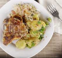 Schnitzel With Potato Salad and Sauerkraut