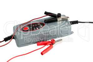 Modern electronic charger for car battery with terminals and jum
