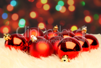 Red christmas ball on the defocused background