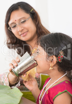 Indian girl drinking water