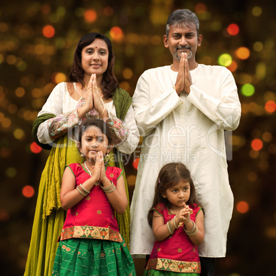 Indian family greeting on diwali