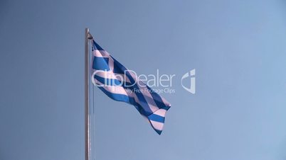 Greece flag in front of a blue sky
