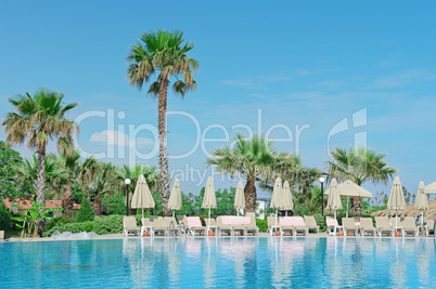 Outdoor swimming pool on the beach sea