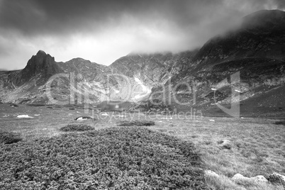 High mountain landscape. Dramatic sky