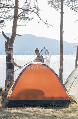 Boy and girl on a campsite