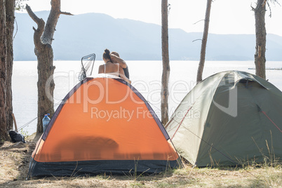 Boy and girl on a campsite