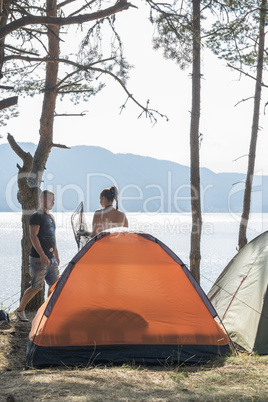 Boy and girl on a campsite