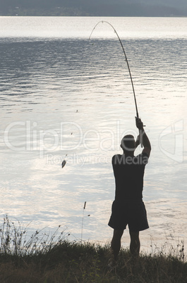 Silhouette of fisherman