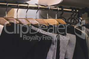 Clothes on hangers in shop