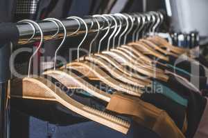 Clothes on hangers in shop