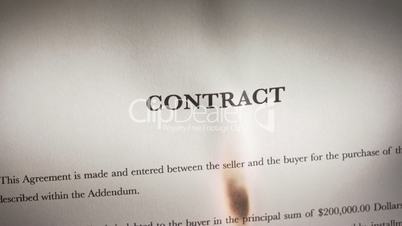 4 Closeup Of Contract In English Burning On Fire