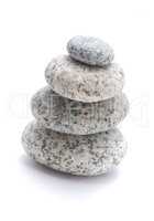 Four pebble sculpture on a white background