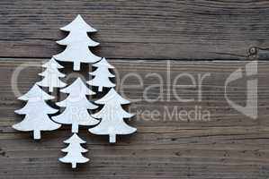 Christmas Trees On  Brown Wooden Background