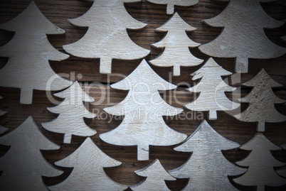 Close Up Of Christmas Trees On Wood With Frame