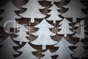 Close Up Of Christmas Trees On Wood With Frame