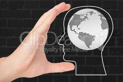Hand reaching for head with globe