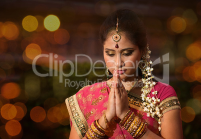 Indian girl praying