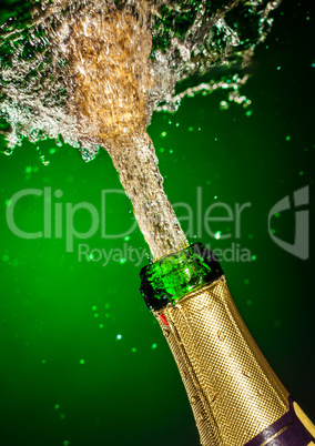 Bottle of champagne with splash