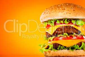 Tasty and appetizing hamburger on a yellow