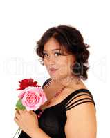 Asian woman holding two rose.